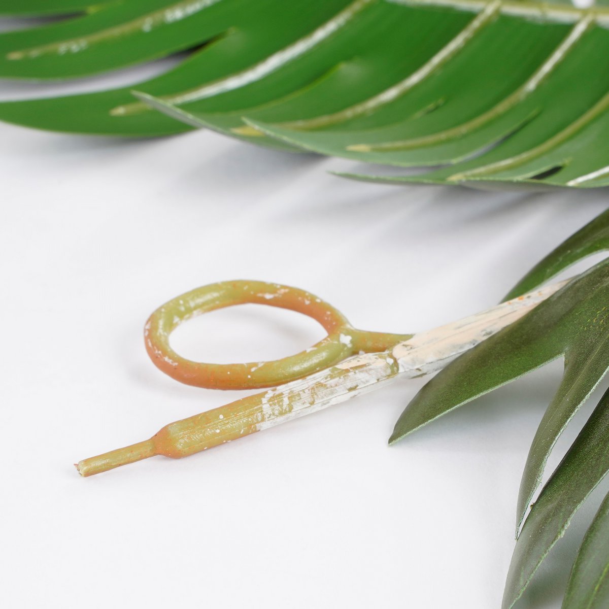 Glimmerdekorationen – Philodendron Selloum Künstliche Pflanzengirlande – L115 x B37 x H9 cm – Grün